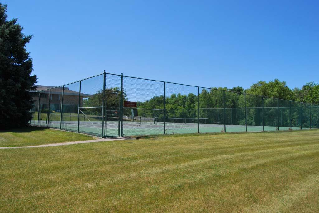 11926 West Mill Road, Unit 4 Milwaukee, WI 53225 - Photo 27 of 34 Tennis court- there are 2