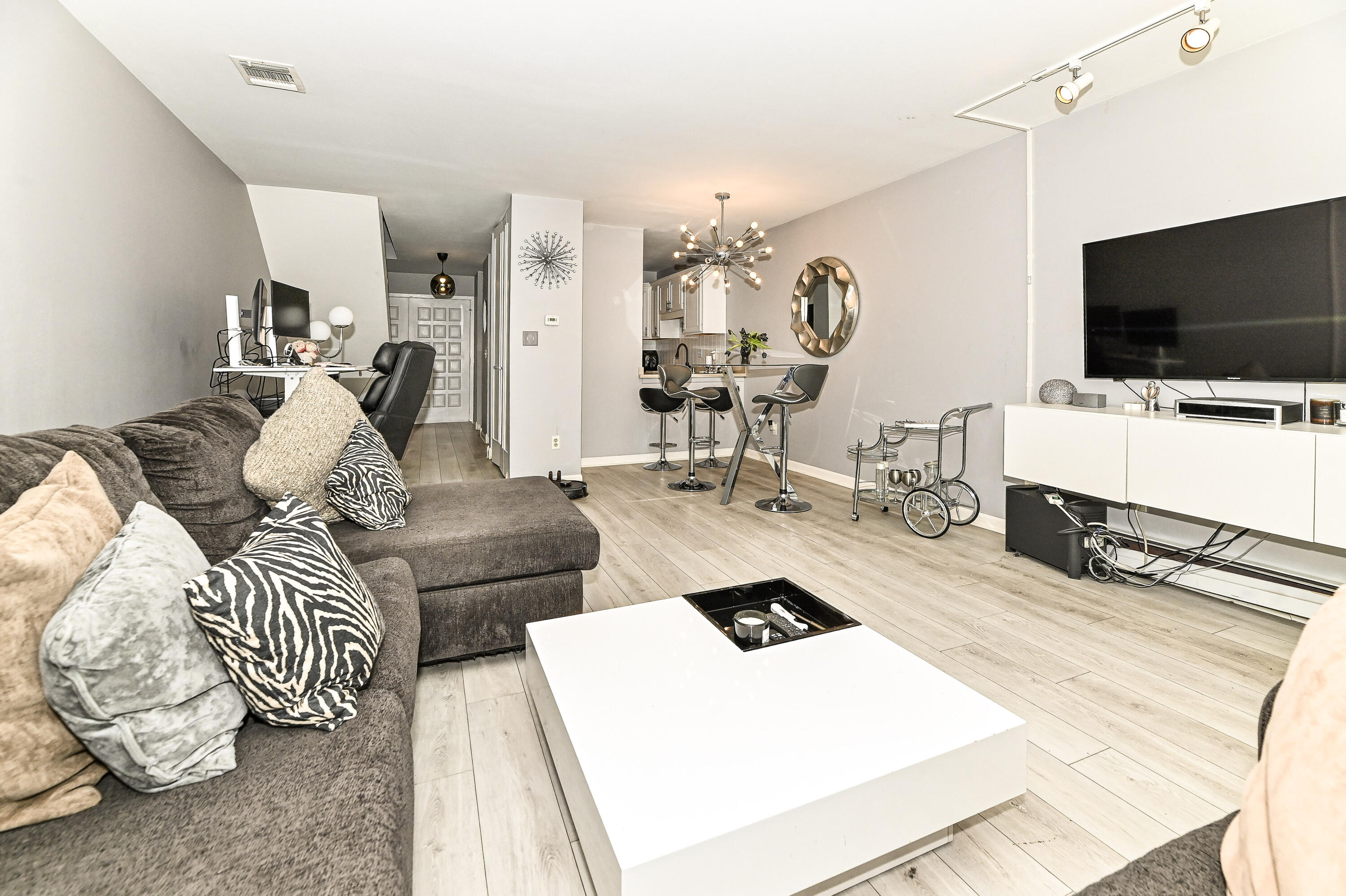 11926 West Mill Road, Unit 4 Milwaukee, WI 53225 - Photo 6 of 34 Living and dining areas