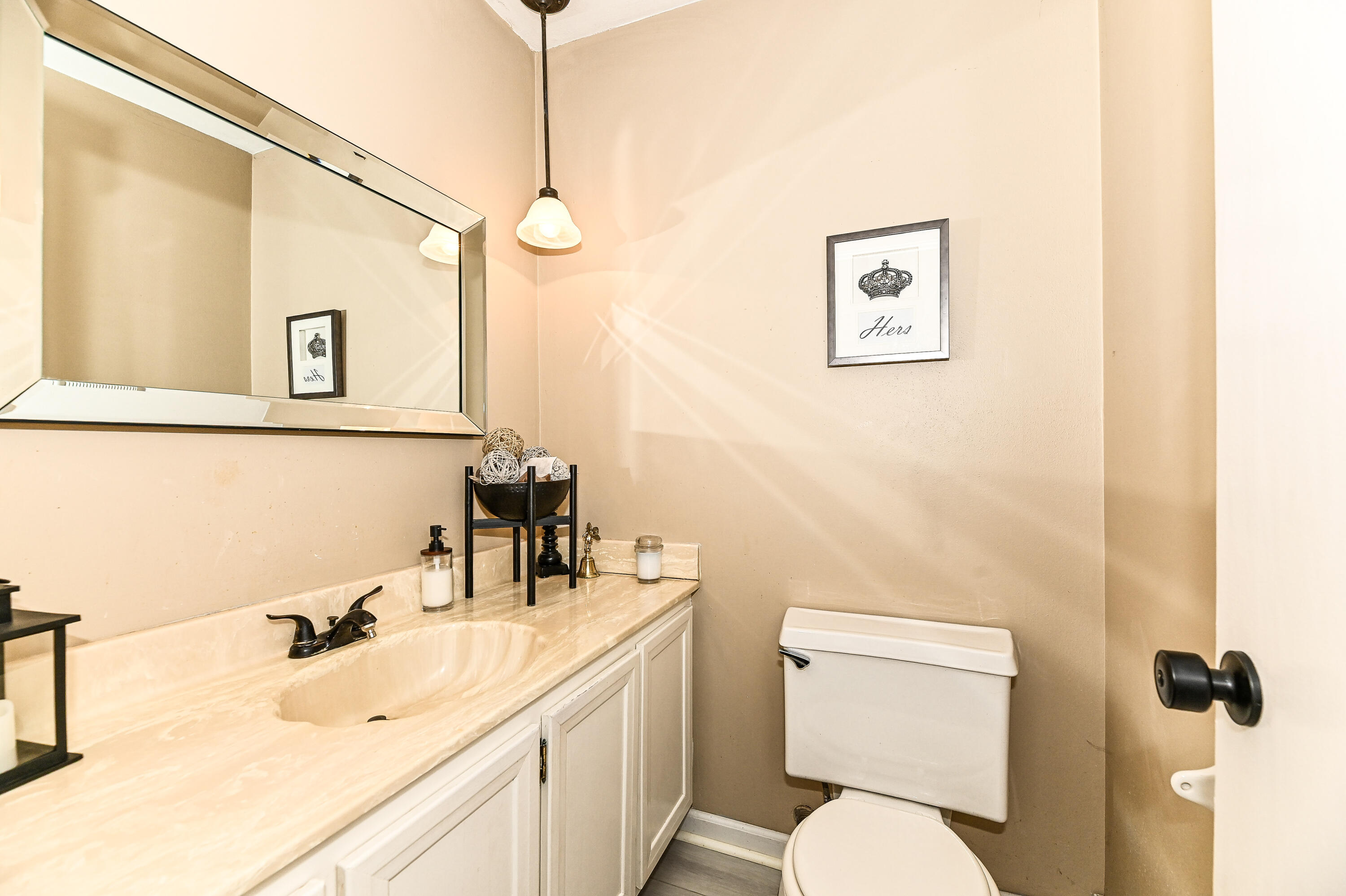 11926 West Mill Road, Unit 4 Milwaukee, WI 53225 - Photo 7 of 34 Powder room on main floor