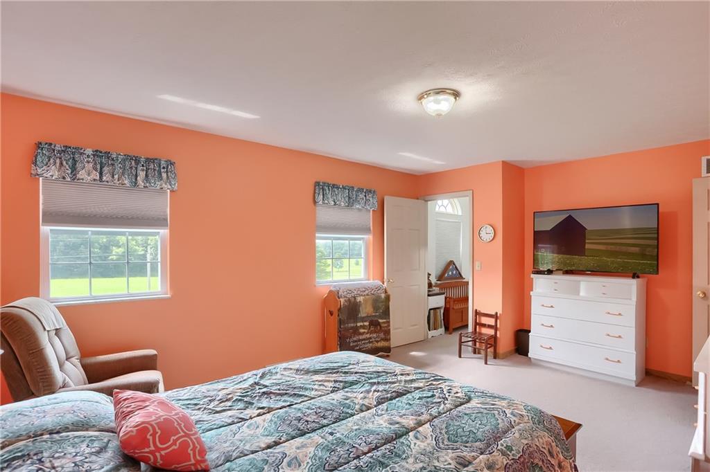 503 Dick Road Butler, PA 16001 - Photo 15 of 27 a bedroom with a bed and furniture