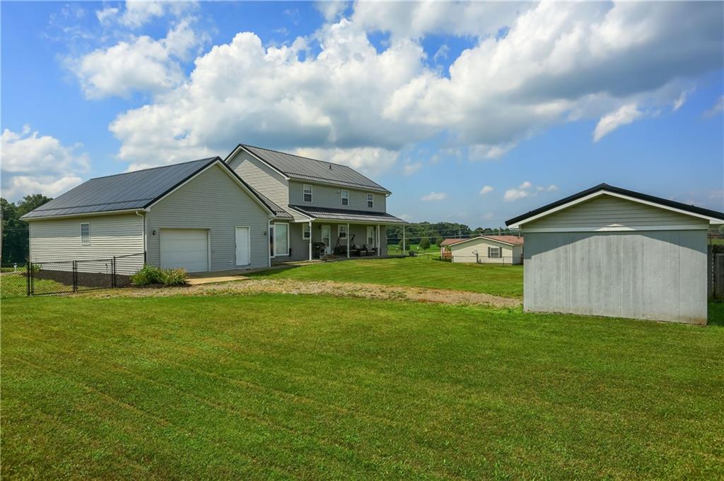503 Dick Road Butler, PA 16001 - Photo 22 of 27 a front view of house with yard and green space