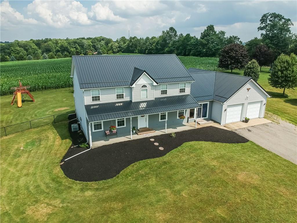503 Dick Road Butler, PA 16001 - Photo 23 of 27 an aerial view of a house with swimming pool