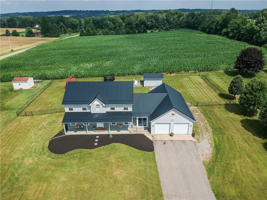 503 Dick Road Butler, PA 16001 - Photo 27 of 27 a view of a house with pool and a yard