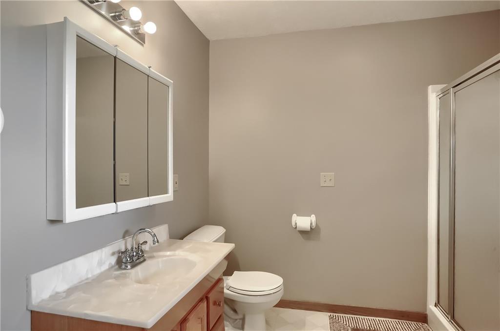 503 Dick Road Butler, PA 16001 - Photo 9 of 27 a bathroom with a sink a toilet and mirror