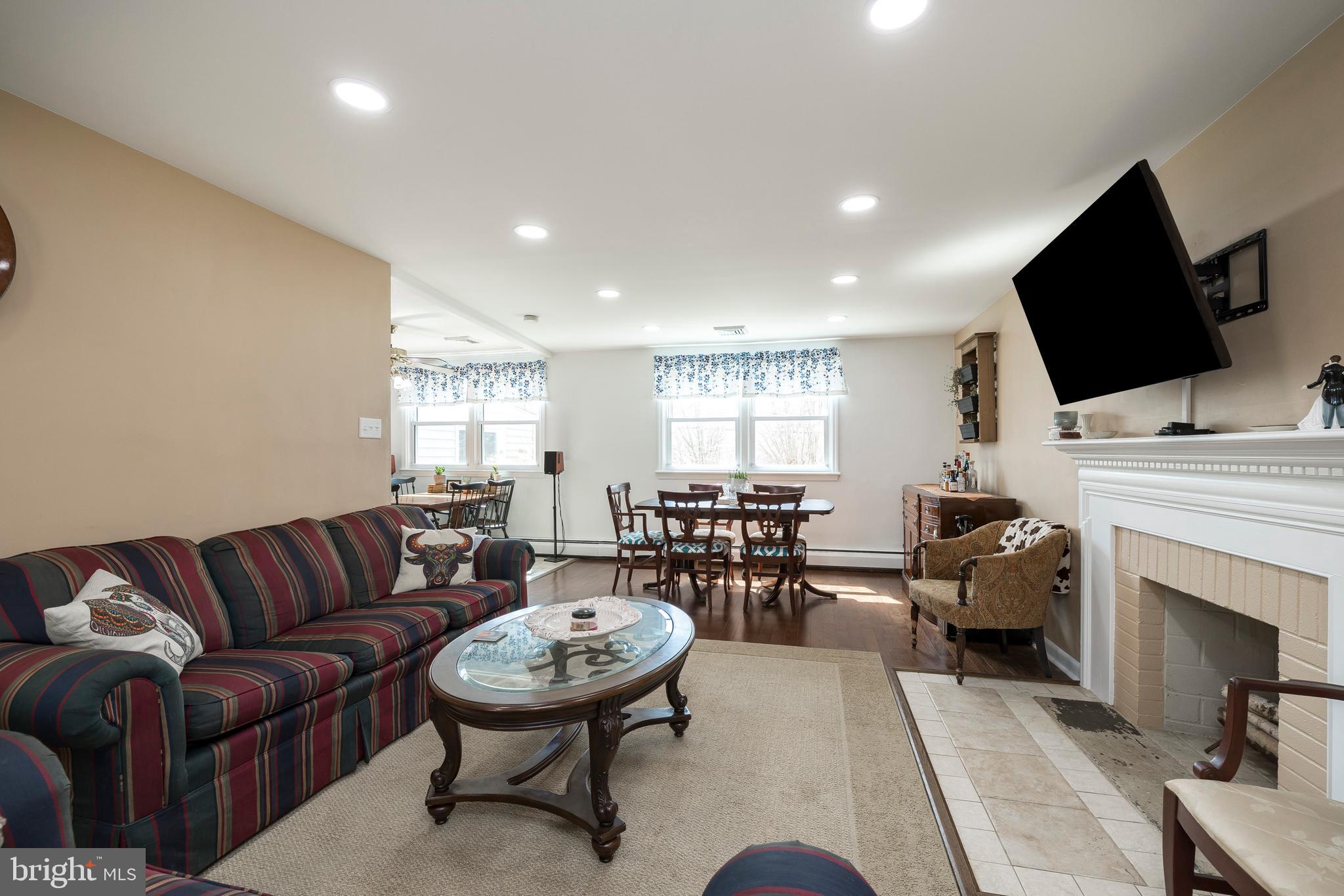84 Conestoga Road Malvern, PA 19355 - Photo 20 of 41 Living room w/fireplace