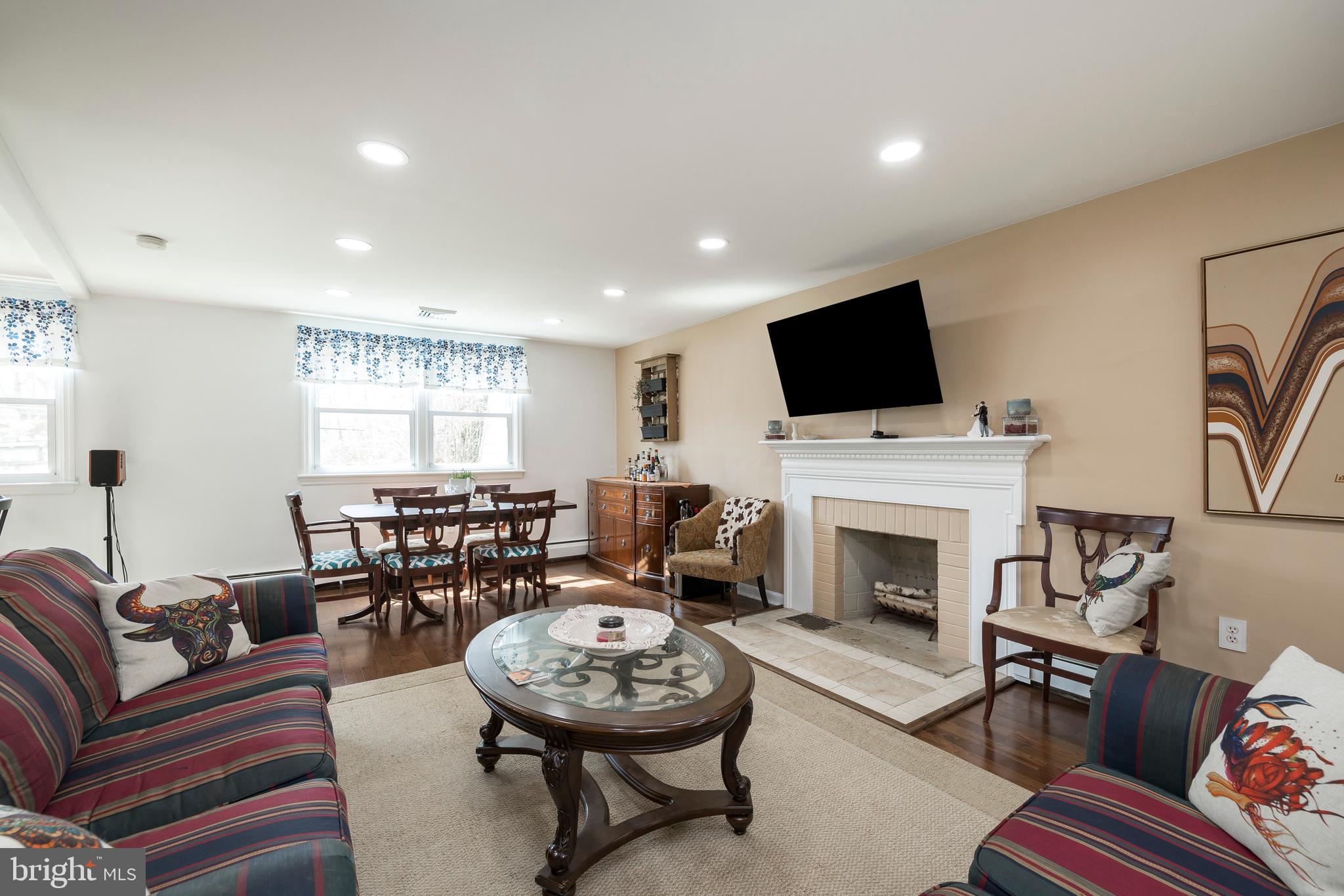 84 Conestoga Road Malvern, PA 19355 - Photo 21 of 41 Living room and dining area