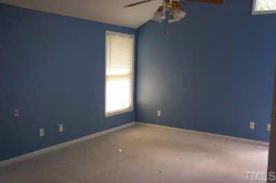 8401 Waynesboro Court Raleigh, NC 27615 - Photo 8 of 10 a view of an empty room with a window