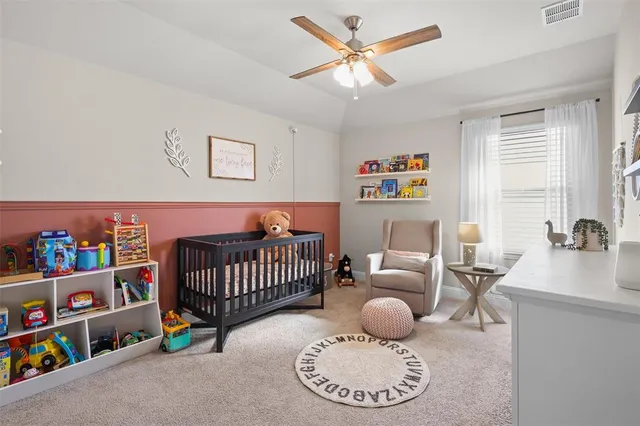 a bedroom with furniture and a wooden floor