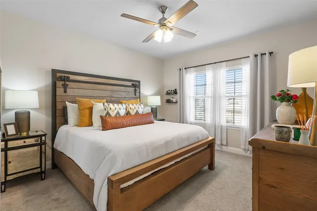 a bedroom with a bed and a couch