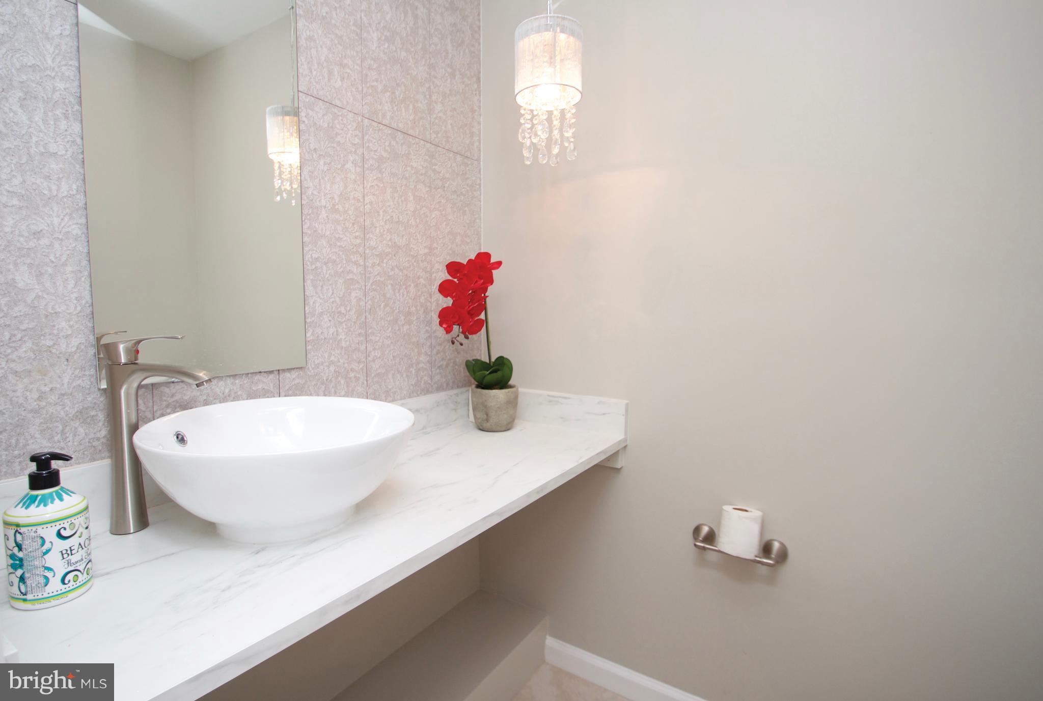 3217 Birchtree Lane Silver Spring, MD 20906 - Photo 10 of 30 Updated Half Bath w/ Vessel Sink