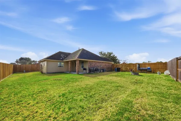 a house view with a garden space