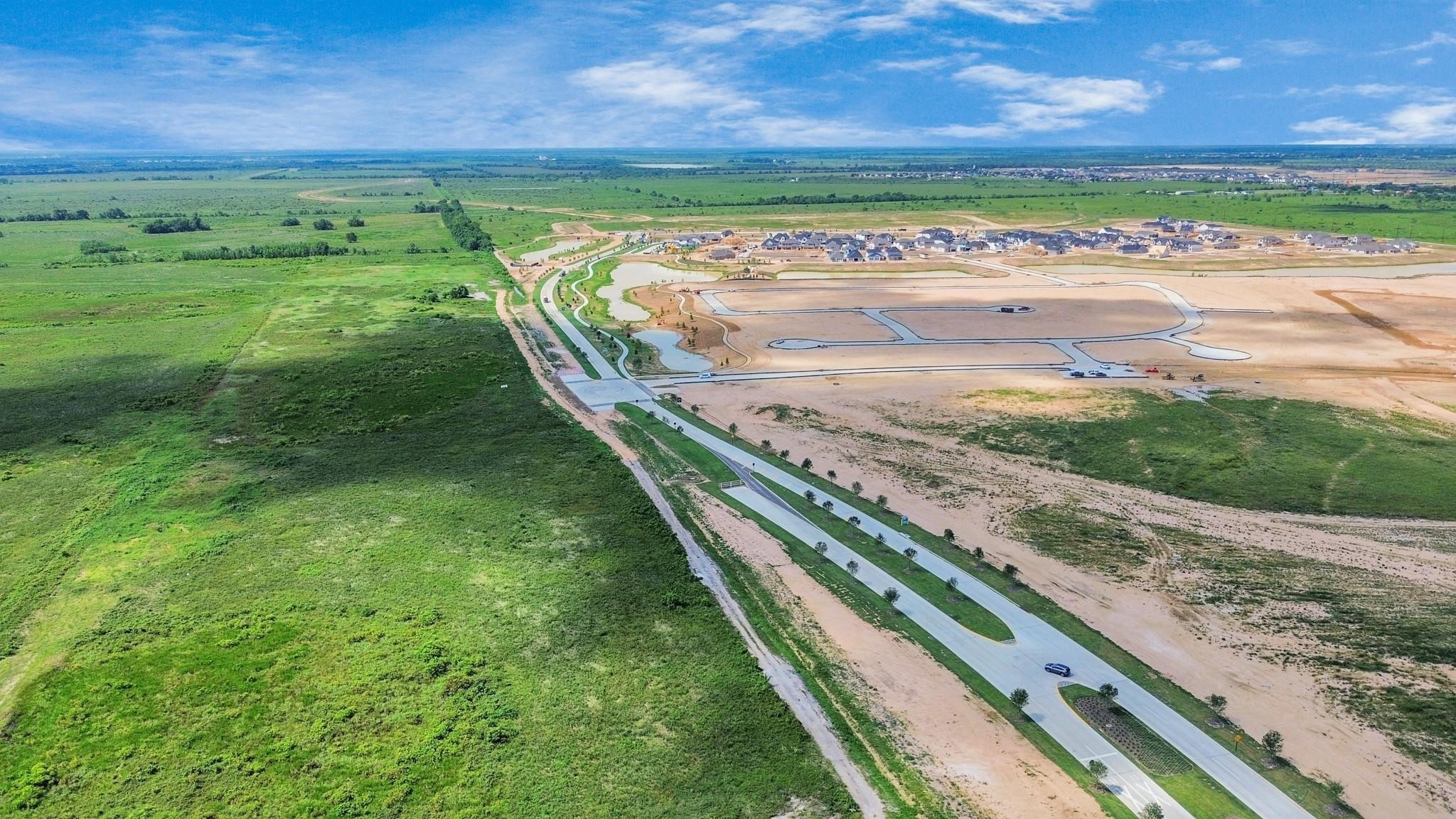 15421 Totis Road Hockley, TX 77447 - Photo 10 of 11 a view of a field with an outdoor space
