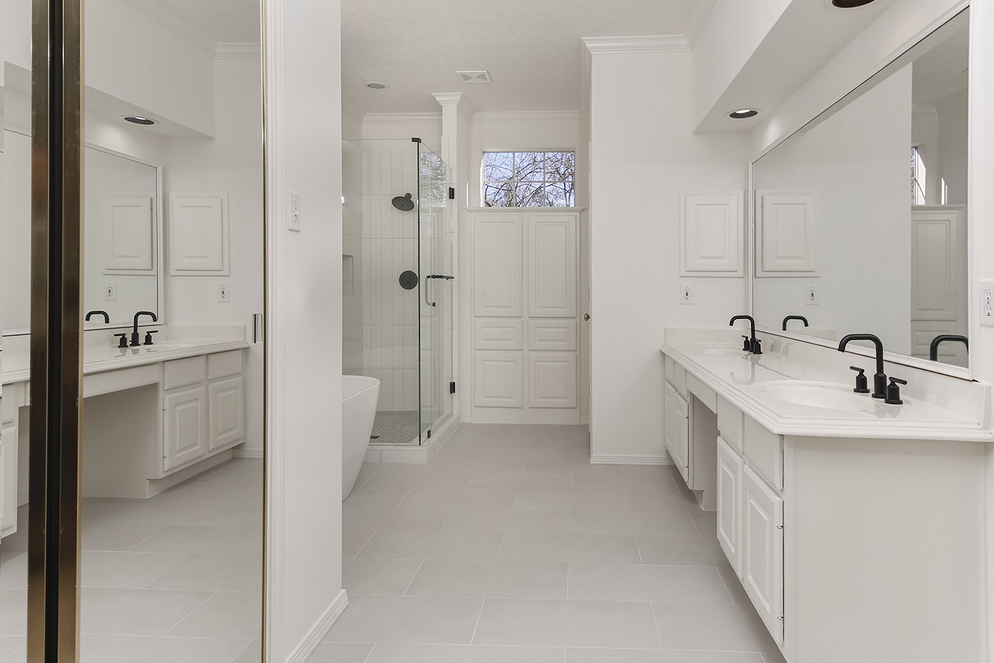 6315 Three Flower Lane Houston, TX 77345 - Photo 16 of 29 a bathroom with a sink and a mirror