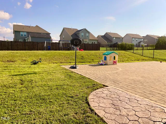 a view of a golf course with a lake