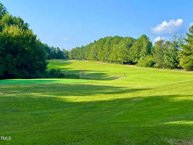 a sign on the wall next to a building