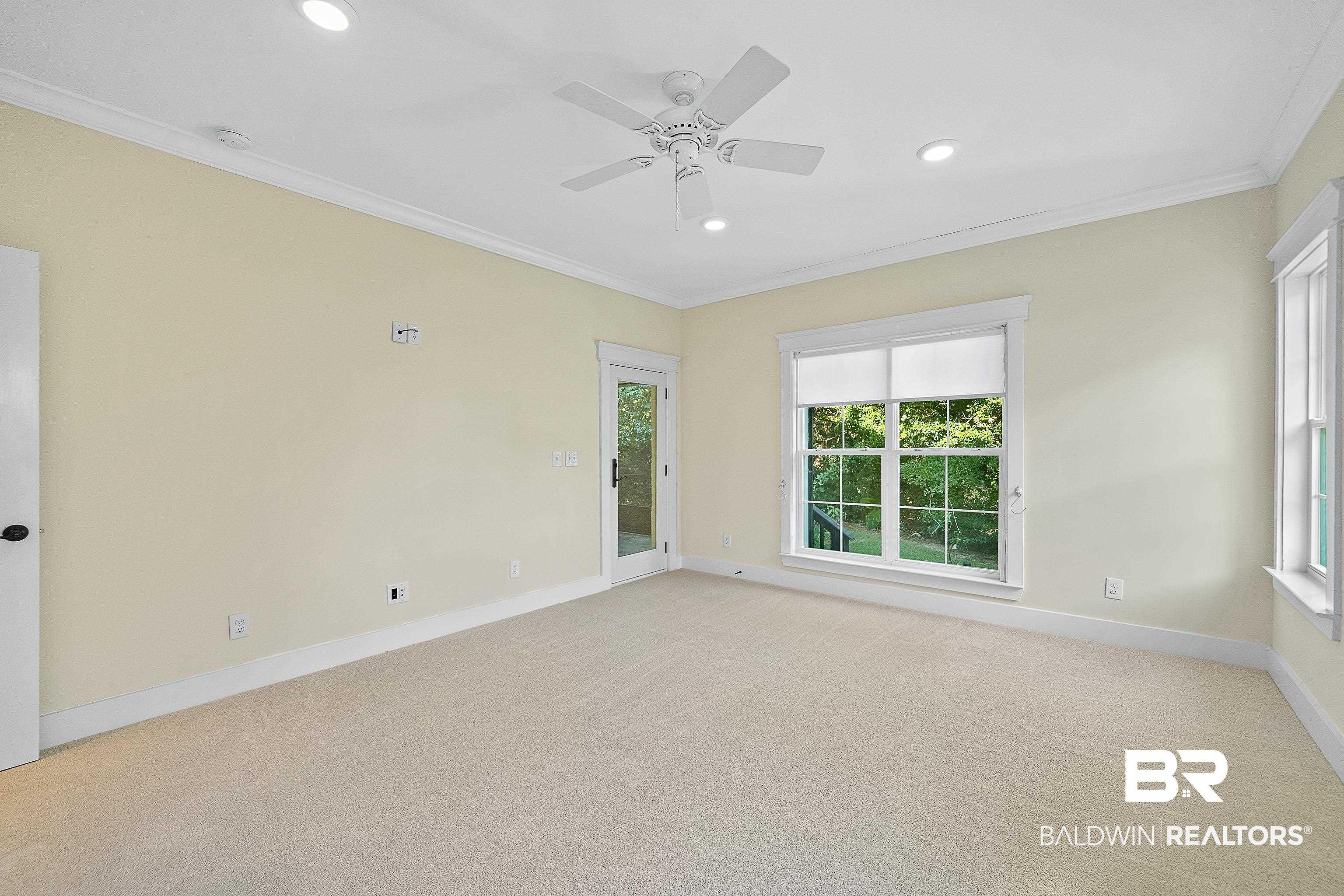 356 Liberty Street Fairhope, AL 36532 - Photo 12 of 39 Spare room with ornamental molding, light colored carpet, recessed lighting, and ceiling fan
