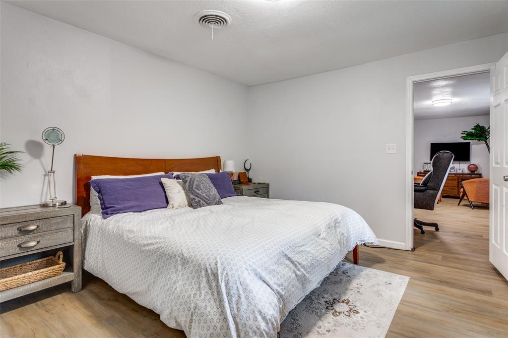 6921 Valhalla Road Fort Worth, TX 76116 - Photo 15 of 25 Bedroom featuring light wood finished floors