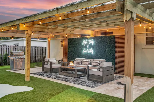 a outdoor living space with furniture and a garden
