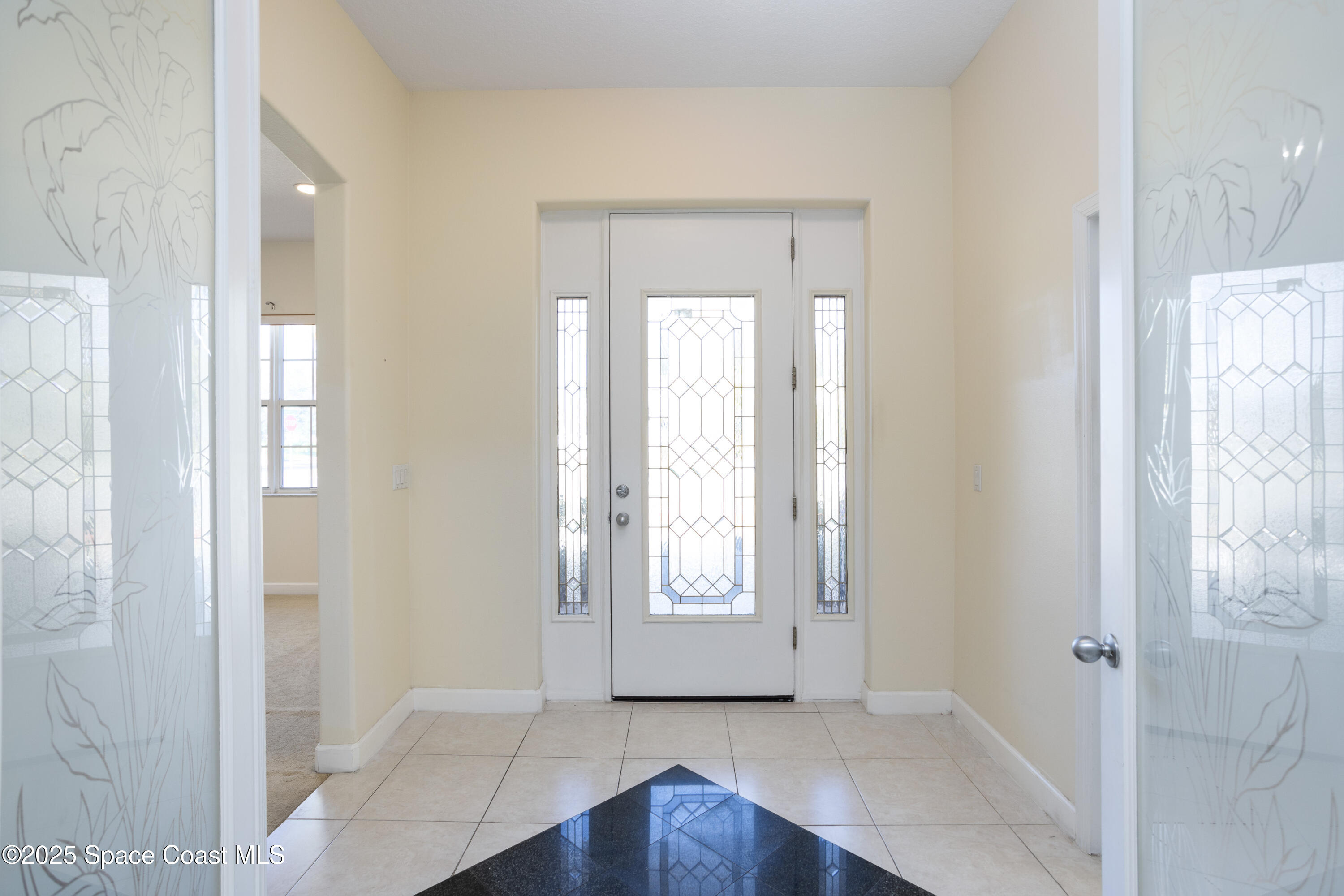 809 Champion Drive Northeast Palm Bay, FL 32905 - Photo 8 of 55 09_Address