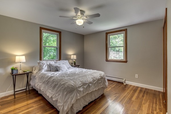 6 Hanson Road Wilmington, MA 01887 - Photo 21 of 29 a bedroom with a bed and a window
