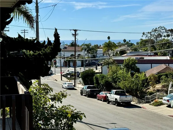 a close view of a utility room with dryer and washer