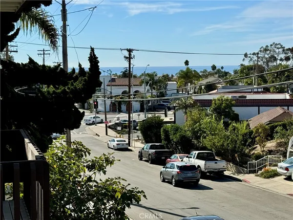 a bathroom with a double vanity sink toilet and shower