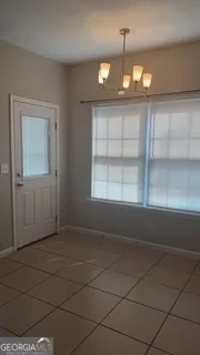 a view of a room with an empty space