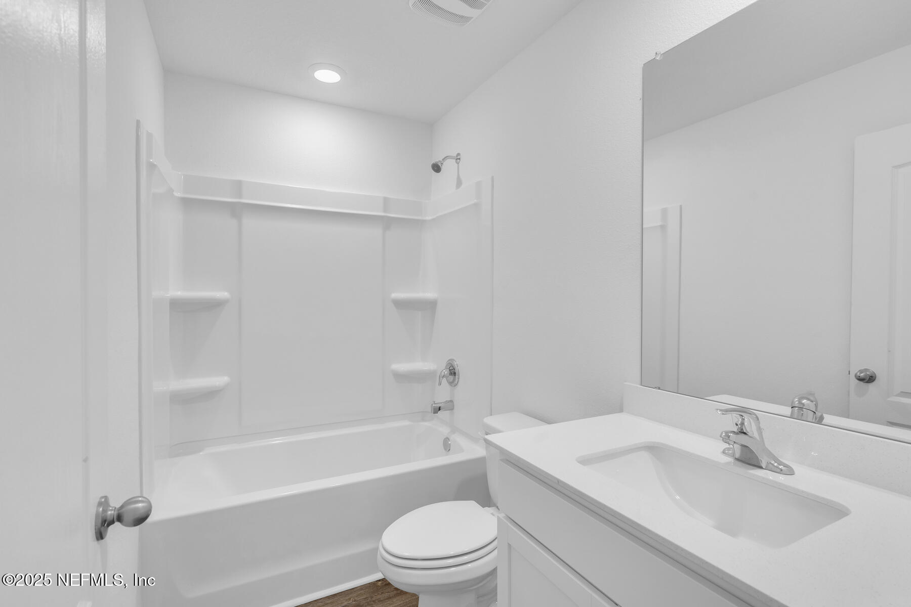 37151 Whippoorwill Court Hilliard, FL 32046 - Photo 17 of 19 a bathroom with a sink a toilet and a bathtub