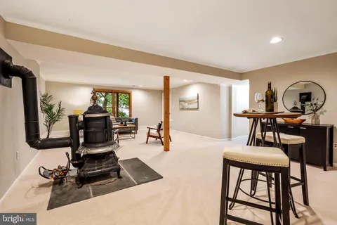 an aerial view of a houses with a yard