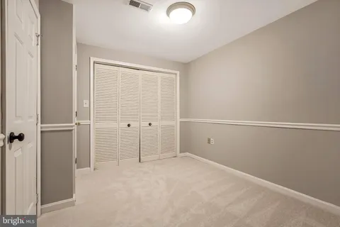 a view of balcony with wooden floor