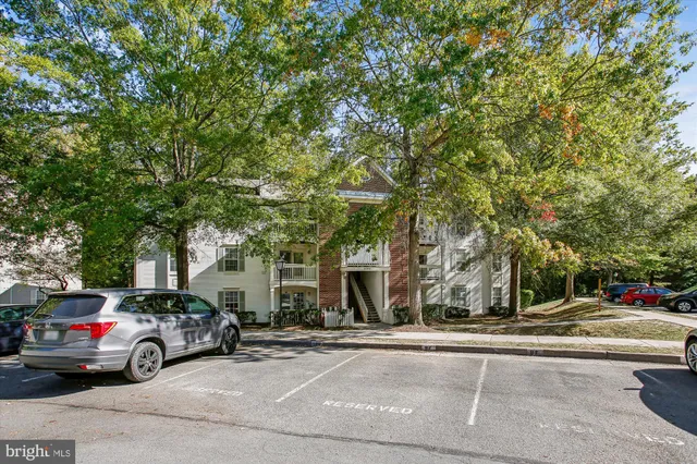 a view of street with parked cars