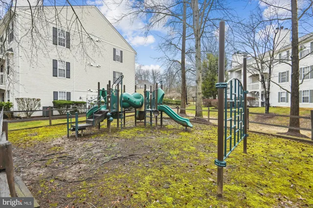 a view of swimming pool with sitting area