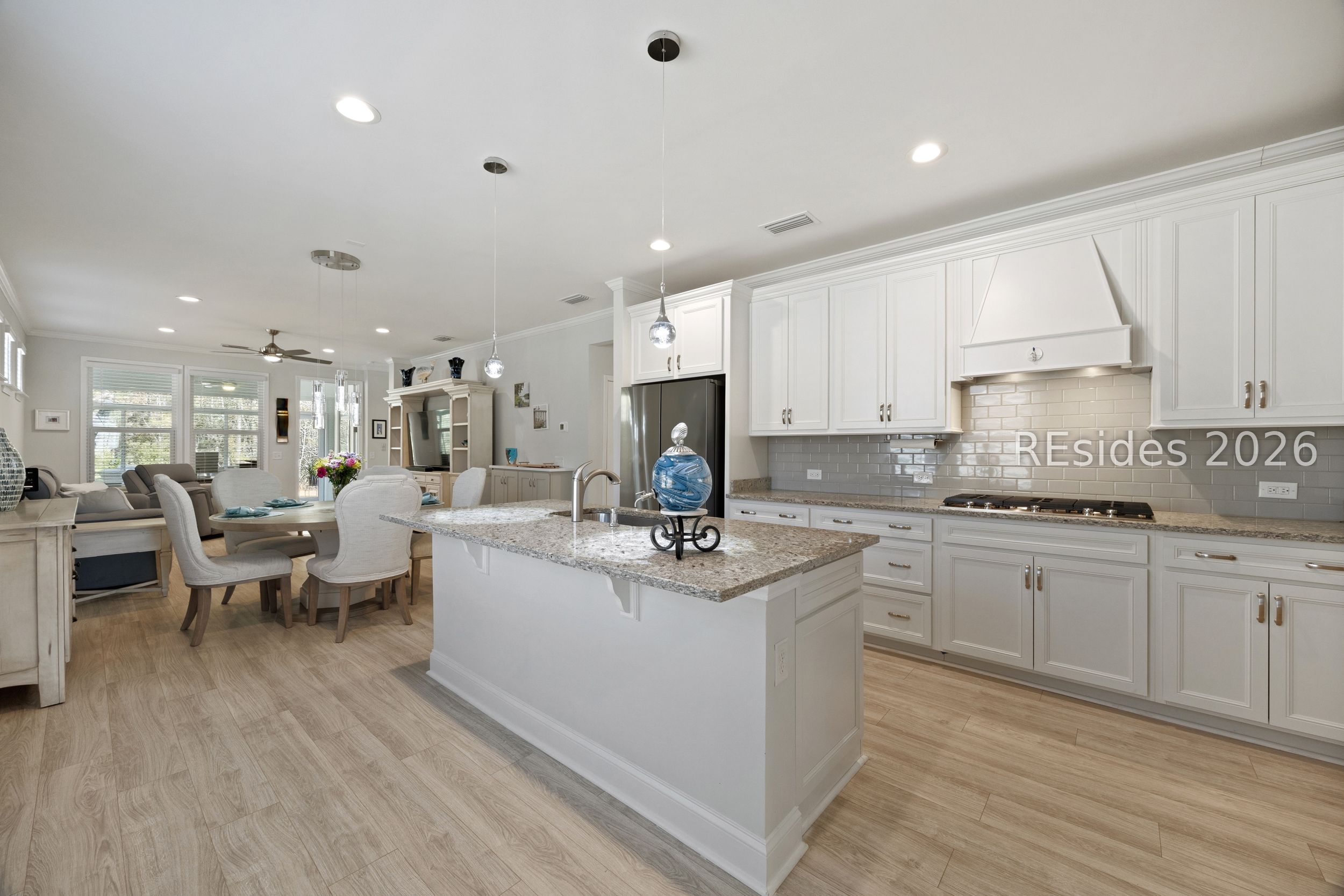 506 Destiny Drive Bluffton, SC 29909 - Photo 15 of 66 Open kitchen and dining design.