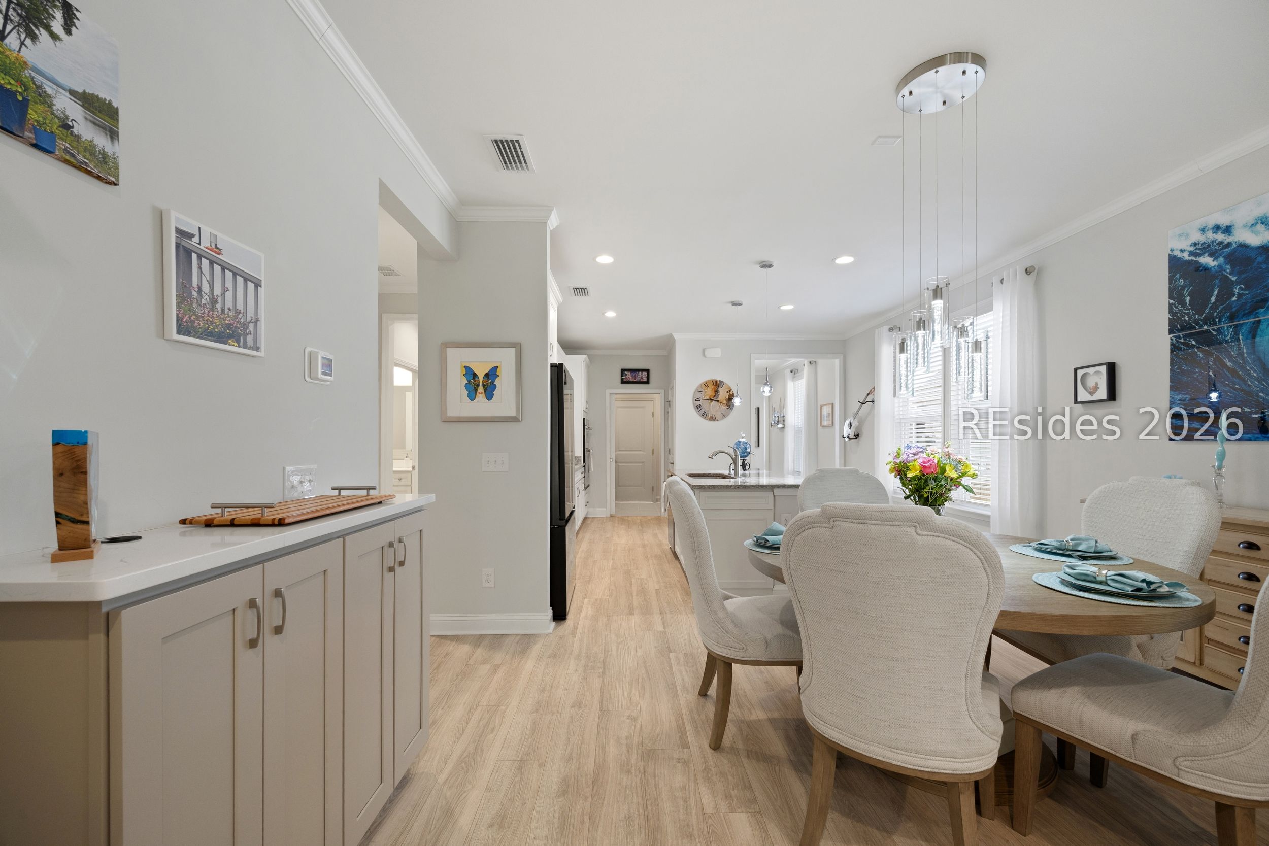 506 Destiny Drive Bluffton, SC 29909 - Photo 30 of 66 Custom wall & bar cabinetry w/ quartz countertops.