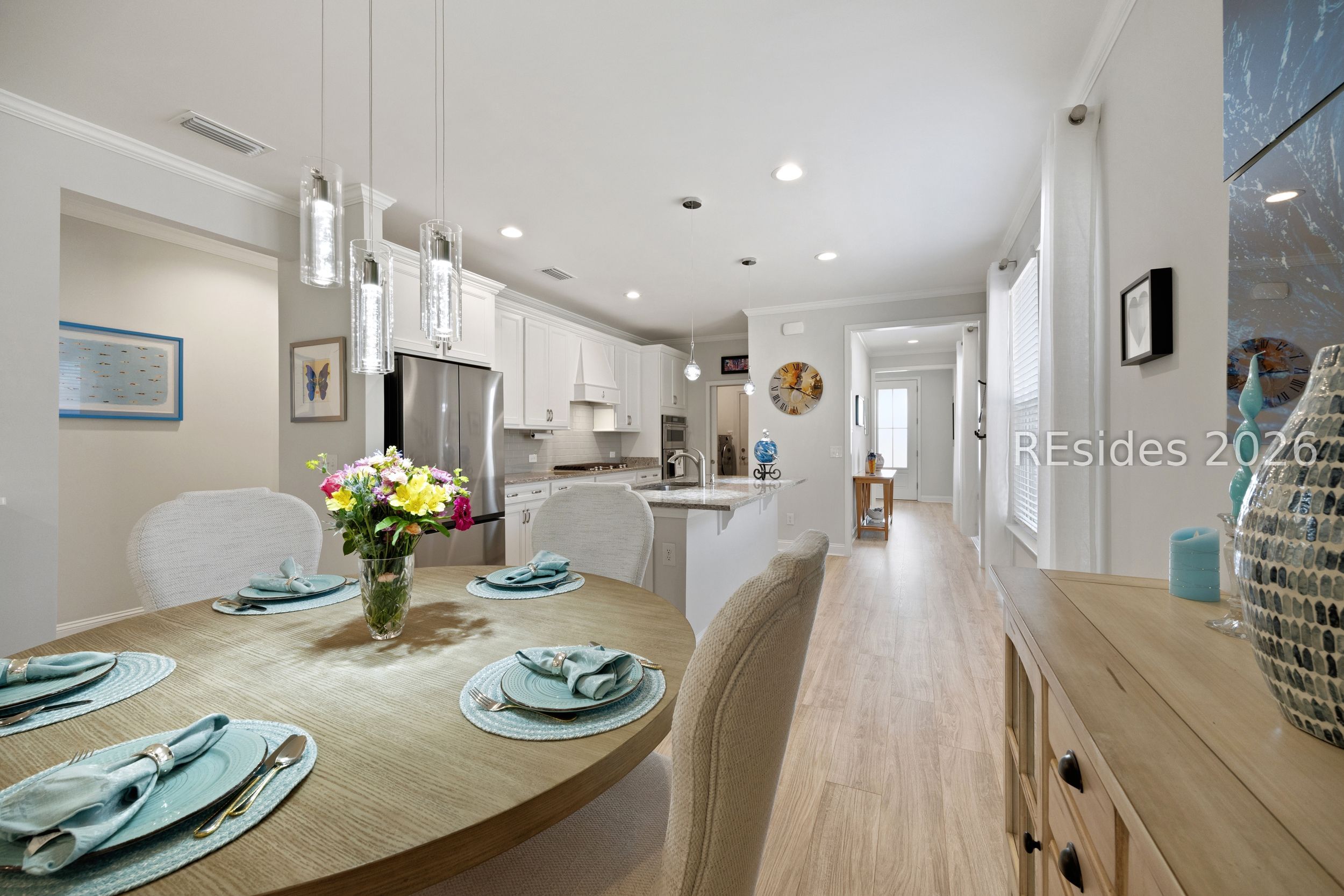 506 Destiny Drive Bluffton, SC 29909 - Photo 32 of 66 Custom chandelier in dining area.