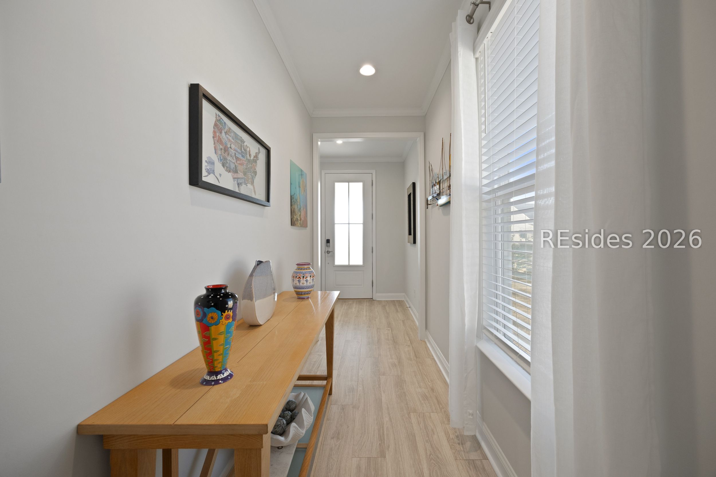 506 Destiny Drive Bluffton, SC 29909 - Photo 9 of 66 Inviting foyer and glass front door.