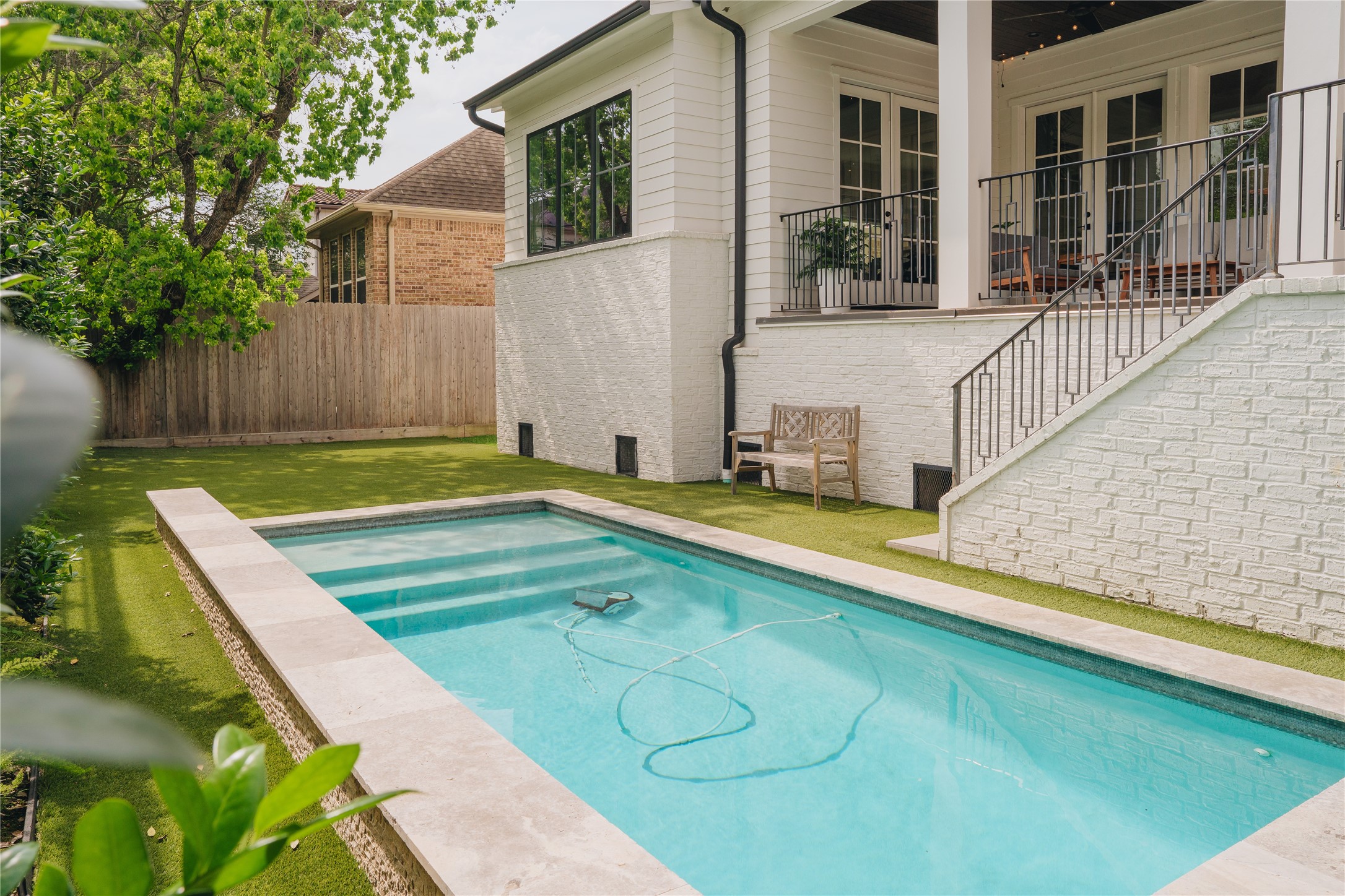 3817 Aberdeen Way Houston, TX 77025 - Photo 44 of 45 Jump in the pool with family and friends, and enjoy the shady greenspace for play or relaxation.