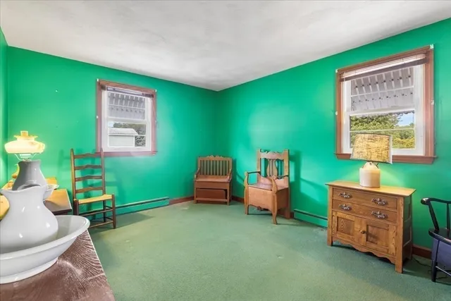 a room with furniture and a window