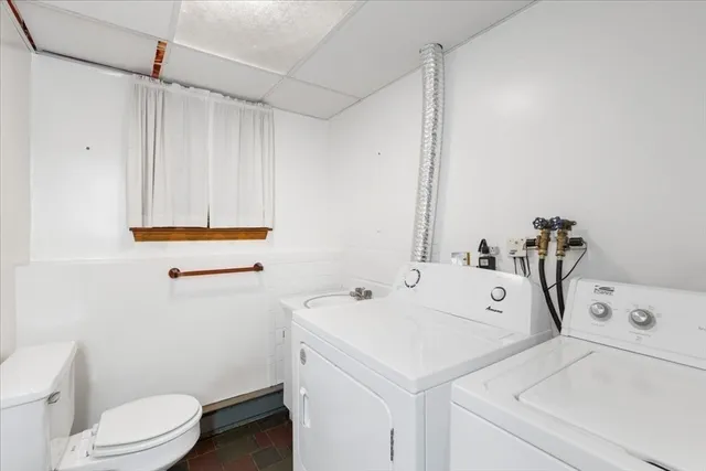 a view of bathroom with a sink and a toilet