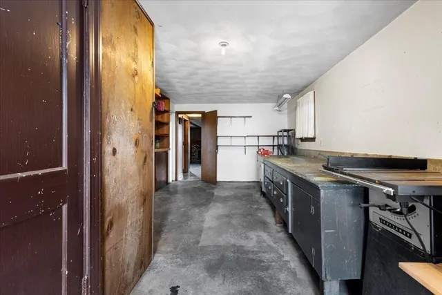 a kitchen with a sink stove and refrigerator