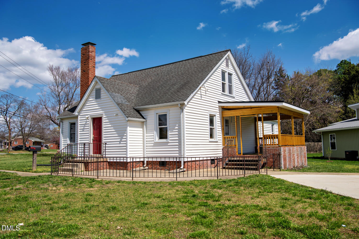 414 South Maple Street Graham, NC 27253 - Photo 42 of 42 a front view of a house with a yard