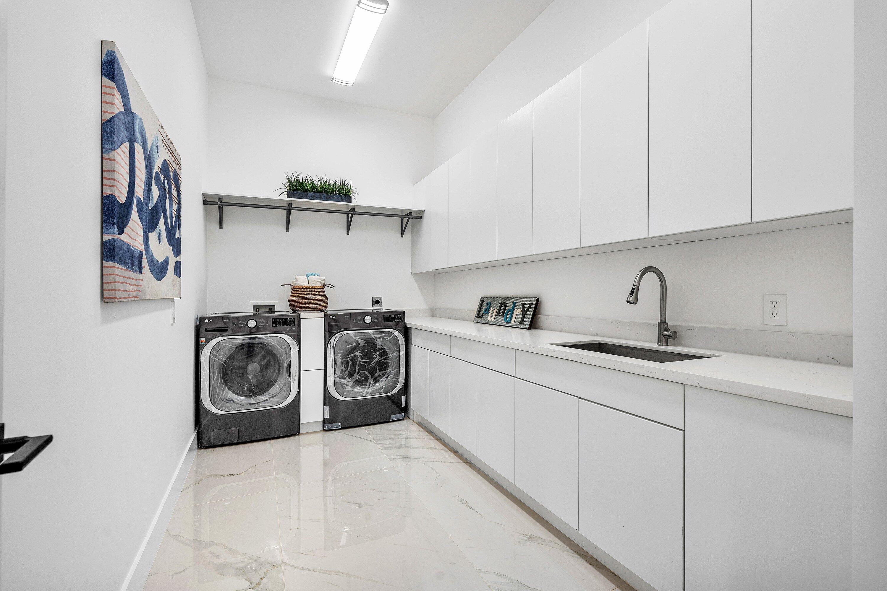 2641 Northeast 48th Street Lighthouse Point, FL 33064 - Photo 48 of 68 Upstairs Laundry Room