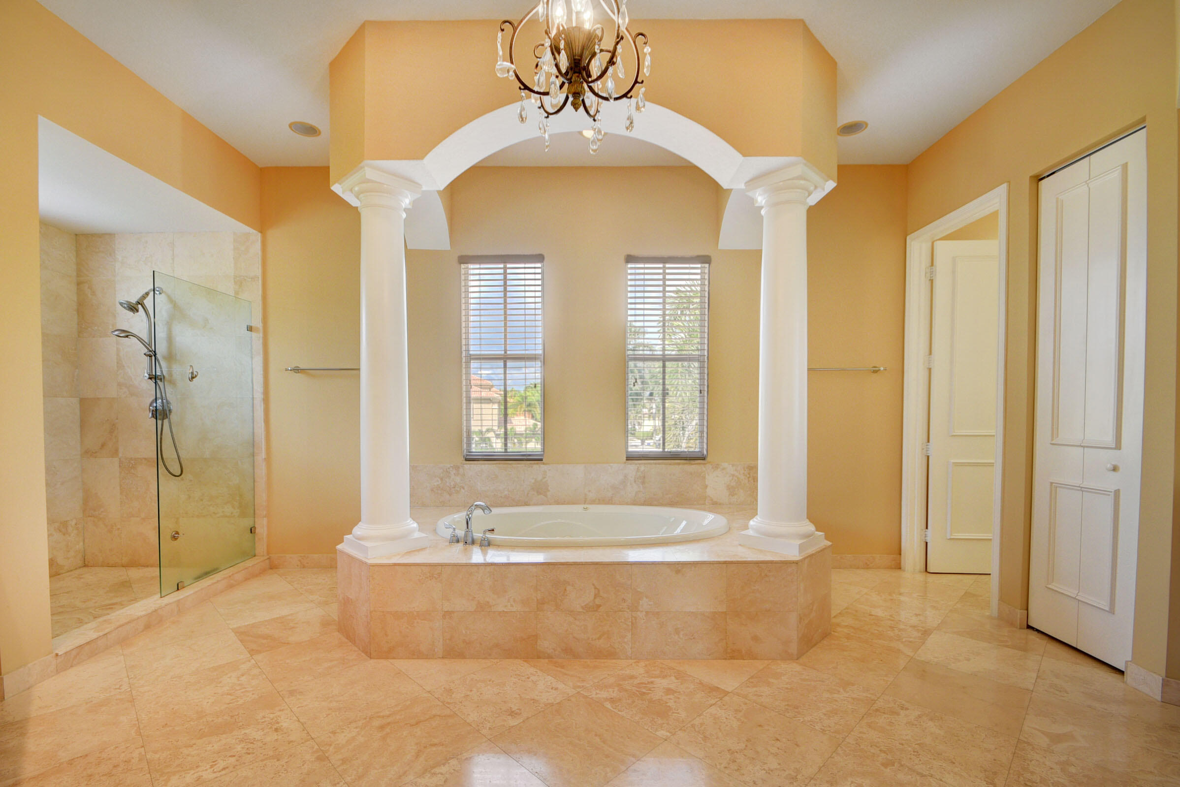 2742 Treanor Terrace Wellington, FL 33414 - Photo 11 of 44 a spacious bathroom with a bathtub and shower