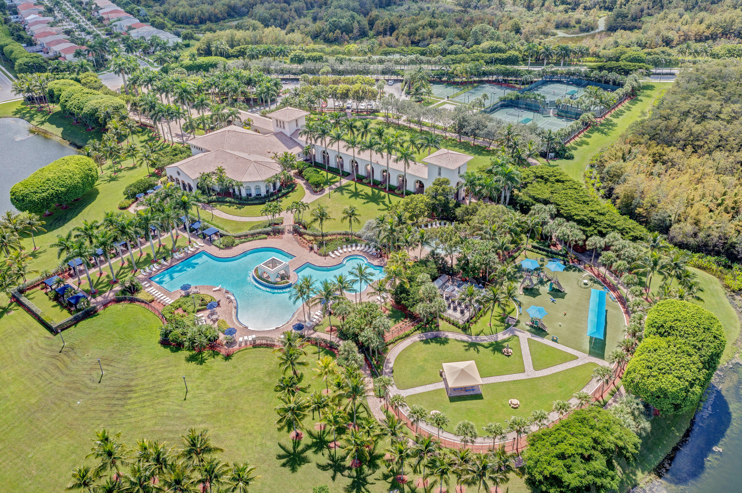 2742 Treanor Terrace Wellington, FL 33414 - Photo 17 of 44 an aerial view of residential house with outdoor space and swimming pool