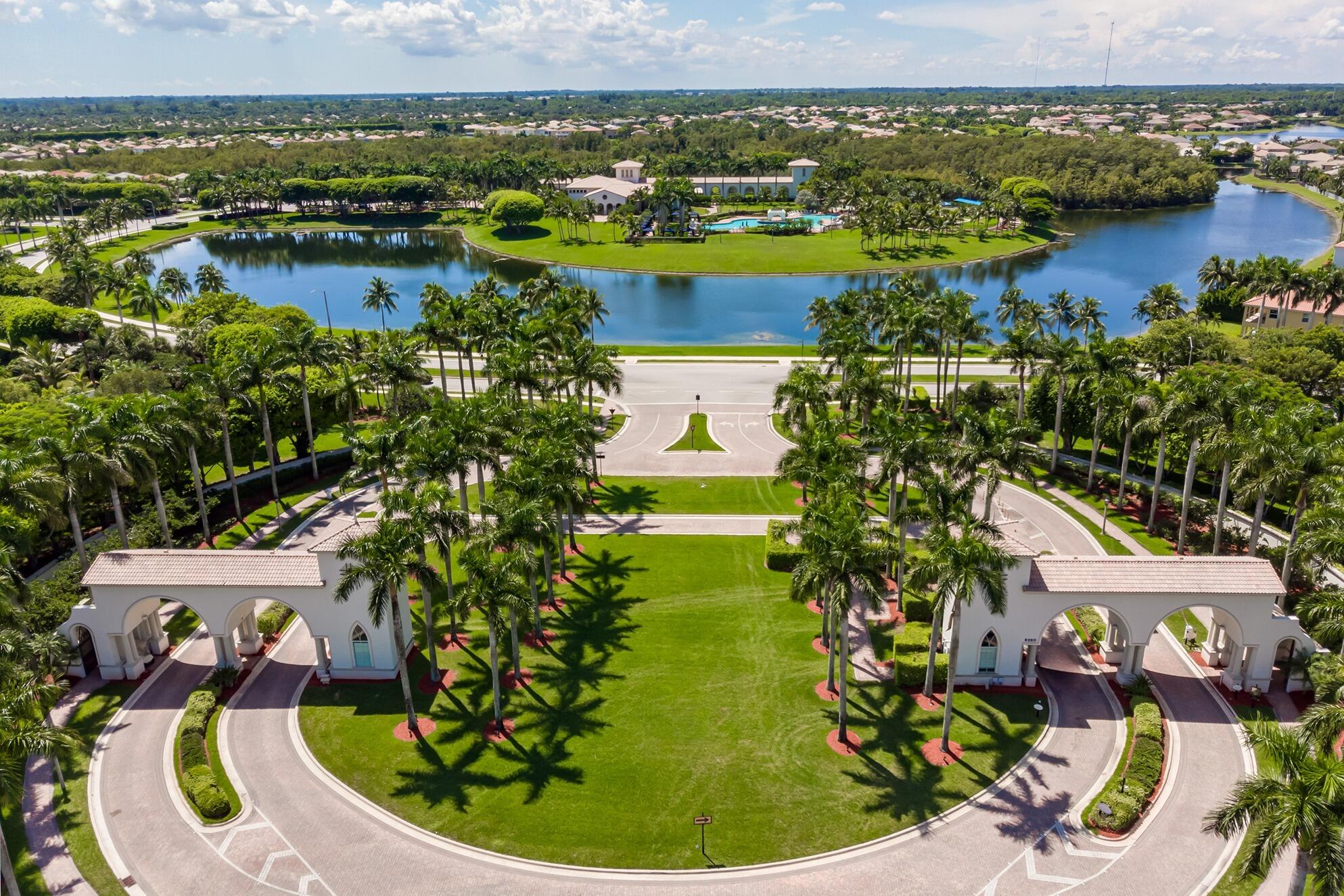 2742 Treanor Terrace Wellington, FL 33414 - Photo 42 of 44 an aerial view of residential houses with outdoor space and swimming pool