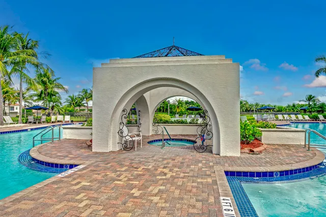 a view of swimming pool with a patio