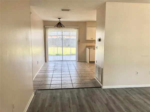 a view of an empty room and window