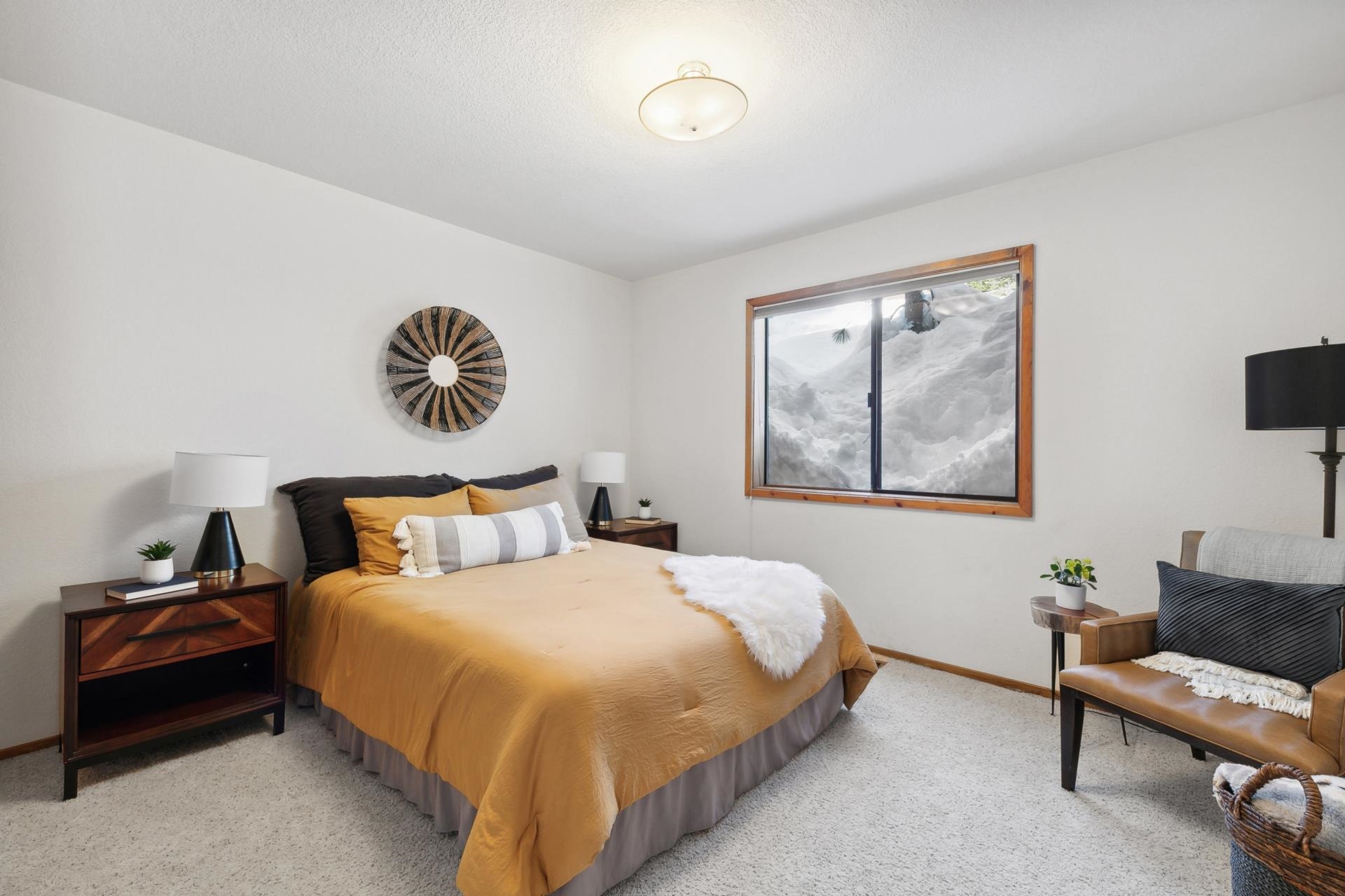 11400 Sitzmark Way Truckee, CA 96161 - Photo 17 of 21 a bedroom with a bed and a wall painting