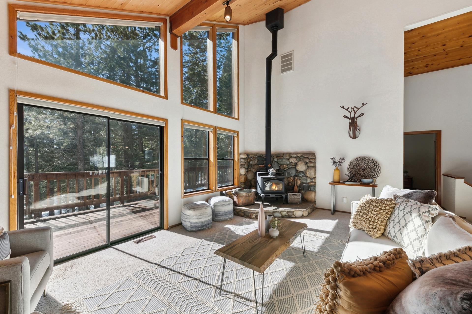 11400 Sitzmark Way Truckee, CA 96161 - Photo 3 of 21 a bedroom with furniture and large windows