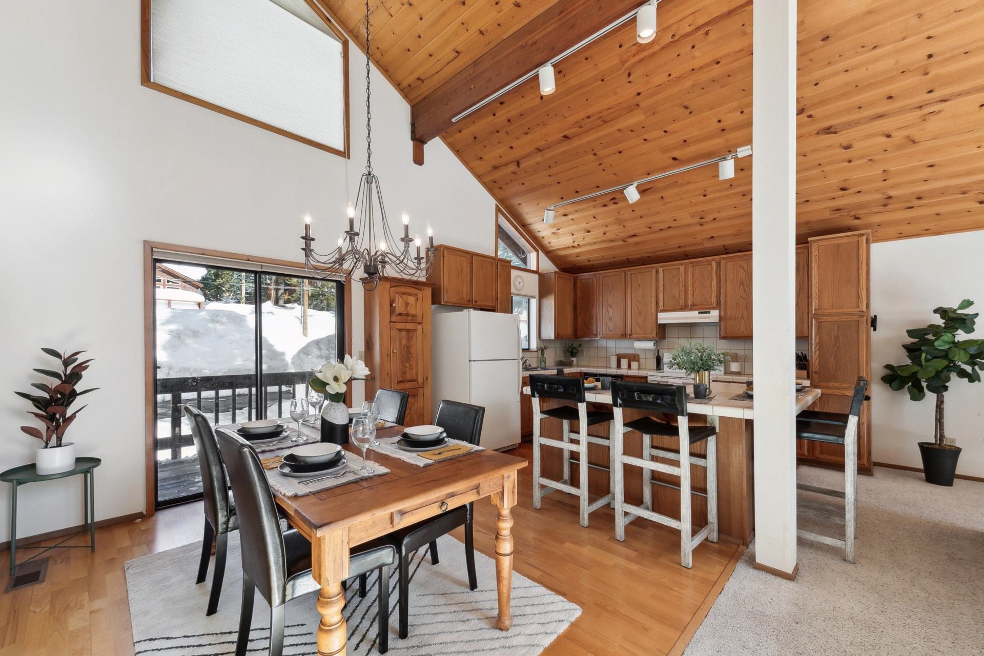 11400 Sitzmark Way Truckee, CA 96161 - Photo 9 of 21 a view of a dining room with furniture window and outside view